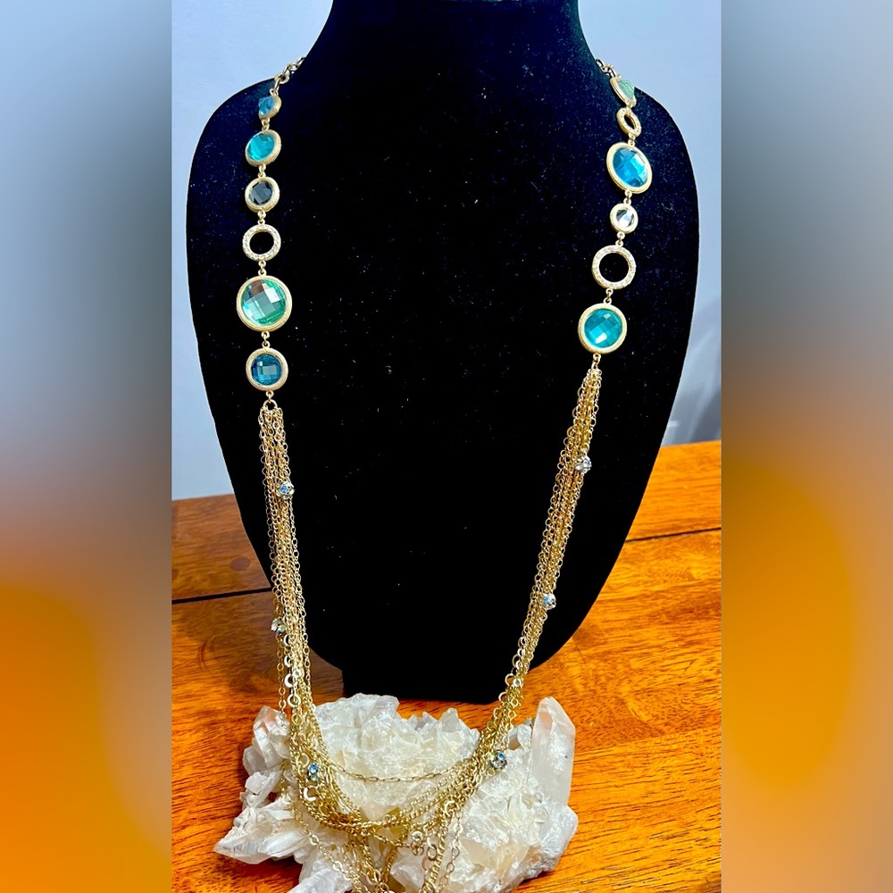 Beautiful Saint Thomas necklace. Lots of crystals, aqua,  & gold tone